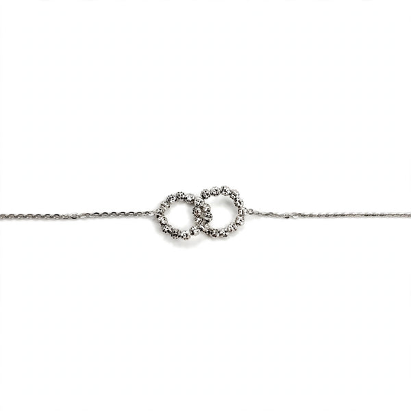 Desmos - Bracciale infinito oro bianco diamantato - Gioielleria Mariatti Torino