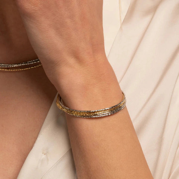 Desmos - Bracciale-semirigido multifilo in argento bicolore diamantato - Gioielleria Mariatti Torino